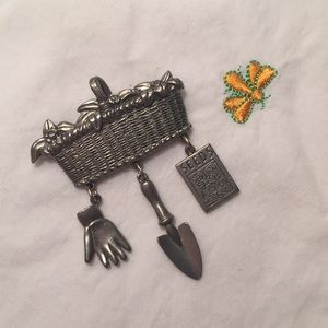 Garden basket tools pin Clift pewter brooch